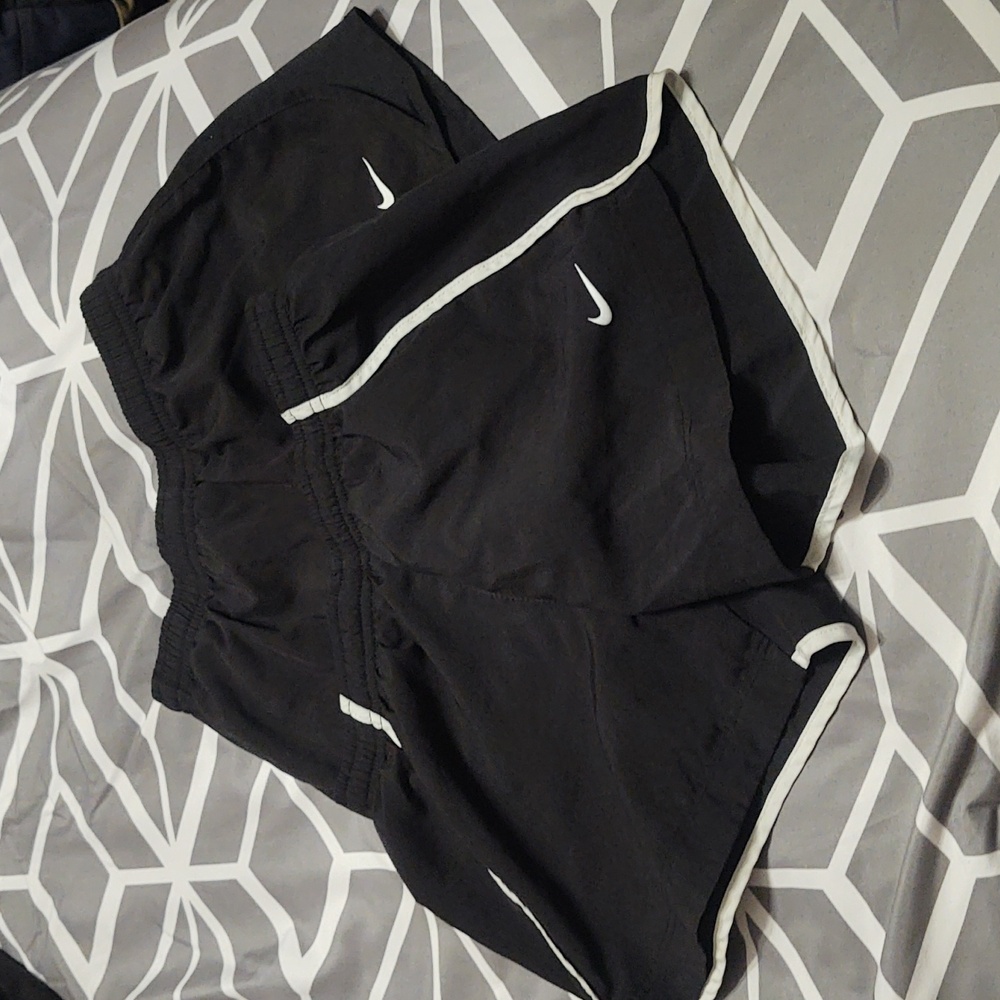 Two pairs of girls Nike